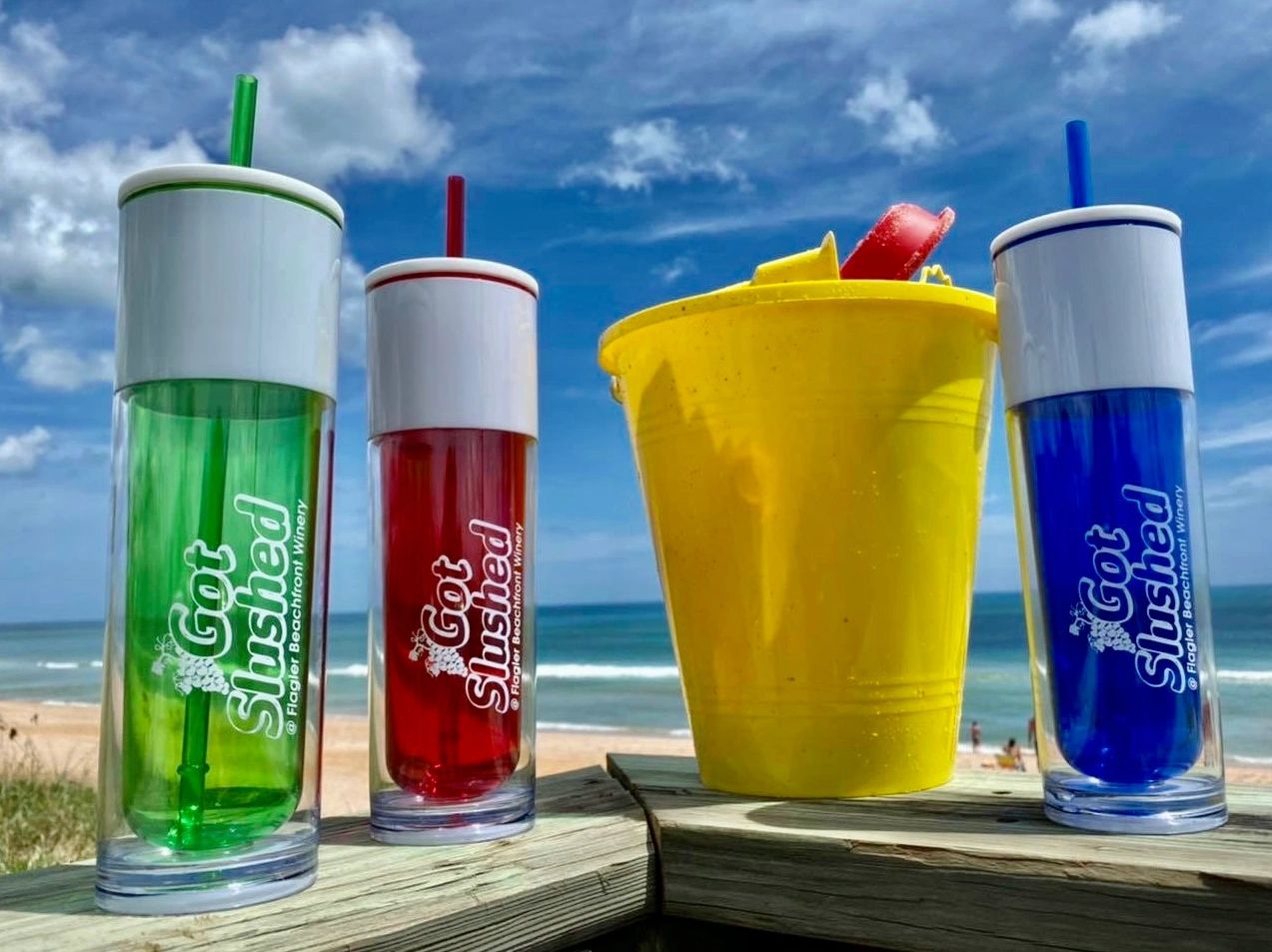 Colorful wine slushies on the beach